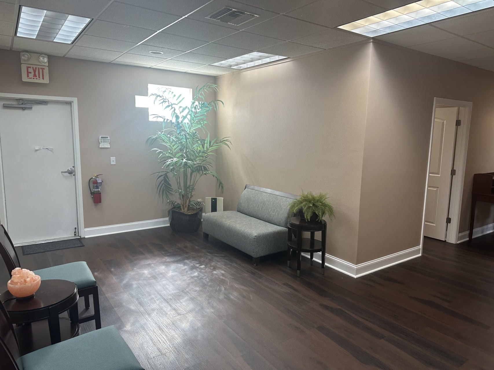 Green laser body sculpting treatment room at Dr. Lara Weight Loss & Wellness — Erchonia laser equipment used for FDA-cleared fat reduction